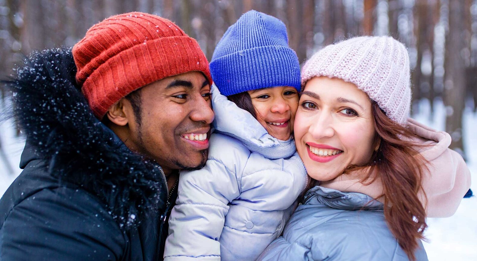 Group of children smiling with blue skies in the background